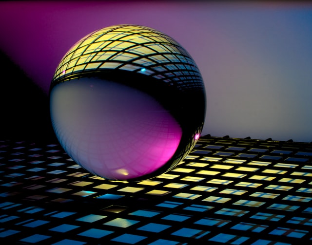 Glass ball on squares for featured article image